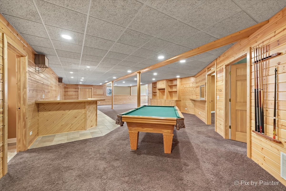 28935 Fox Street Cary, IL 60013 - Photo 34 of 50 a room with pool table and chairs
