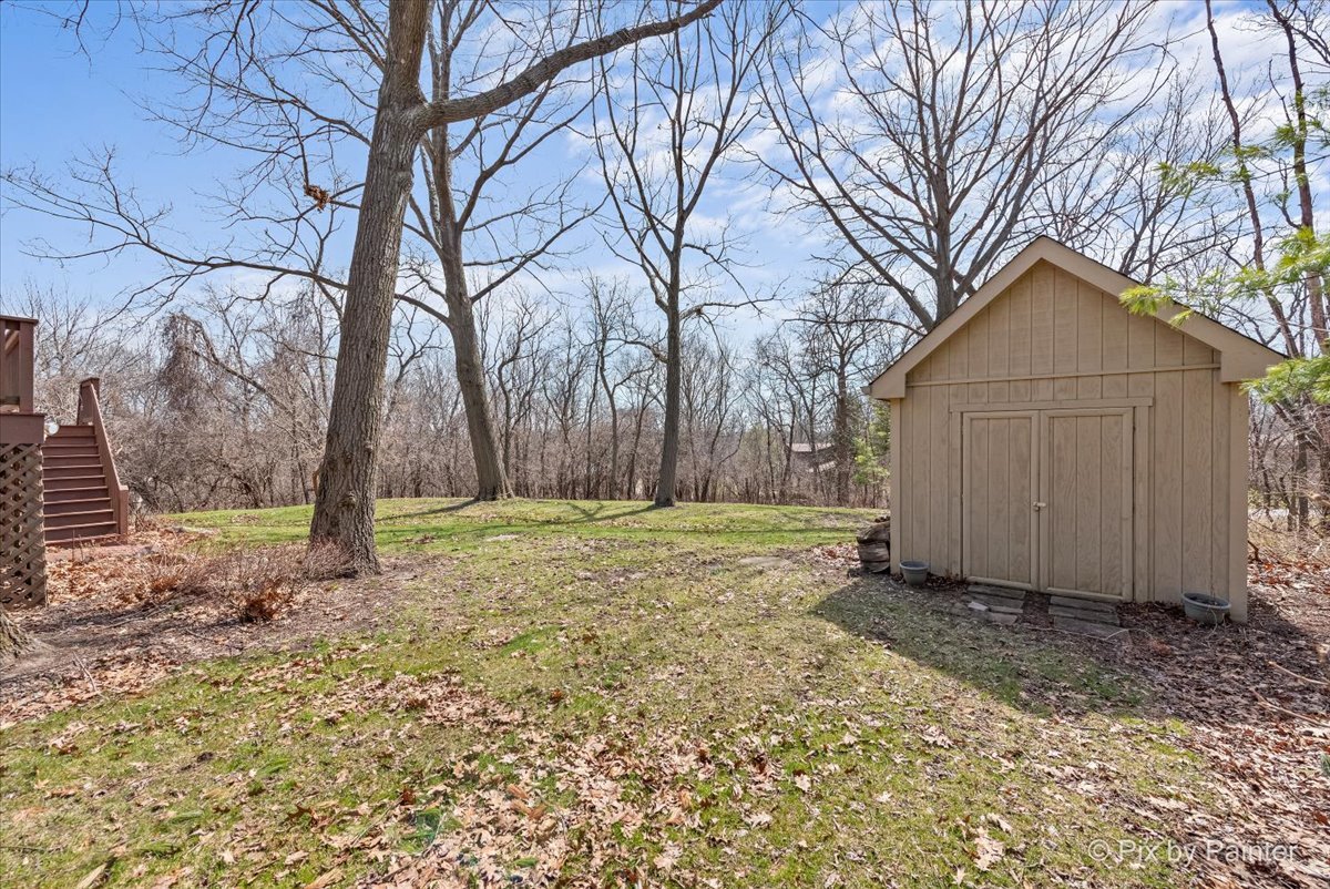 28935 Fox Street Cary, IL 60013 - Photo 40 of 50 a view of a backyard with large tree