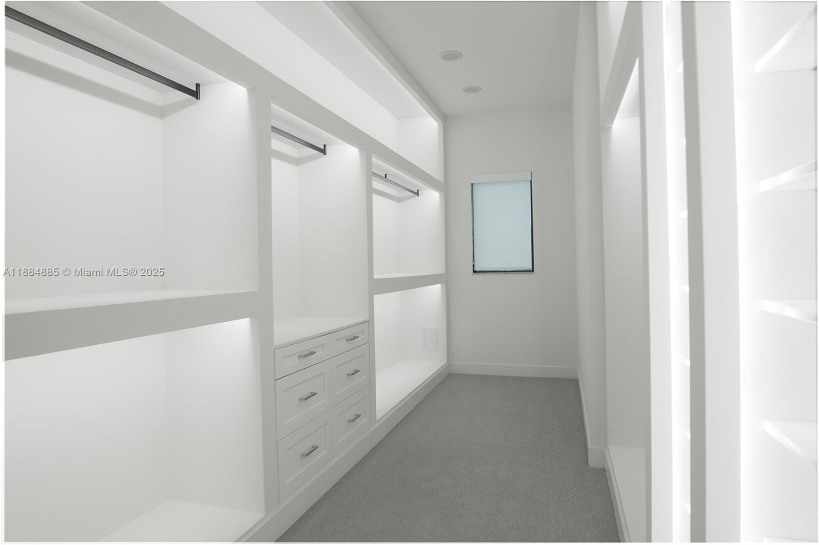 17241 Carretto Court Boca Raton, FL 33496 - Photo 13 of 35 a bathroom with a double vanity sink and mirror