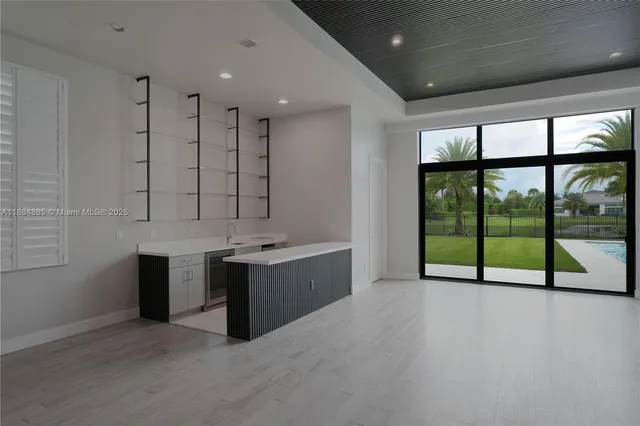 a view of an empty room with a projector