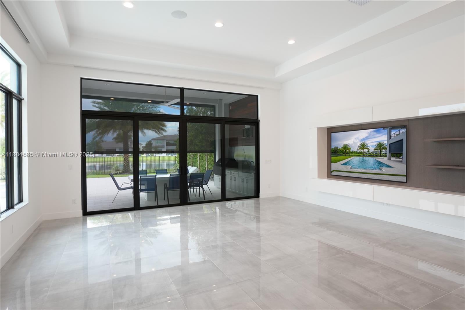 17241 Carretto Court Boca Raton, FL 33496 - Photo 24 of 35 a view of an empty room with window