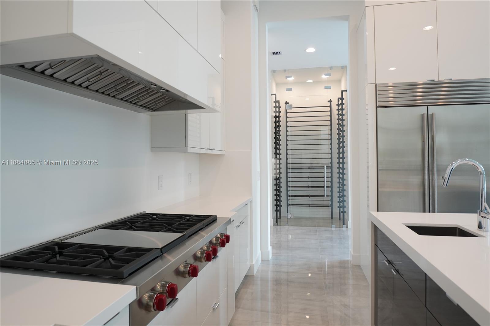 17241 Carretto Court Boca Raton, FL 33496 - Photo 25 of 35 a kitchen with a stove and a refrigerator