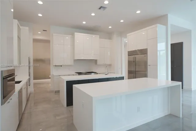 a view of storage and utility room with washer and dryer
