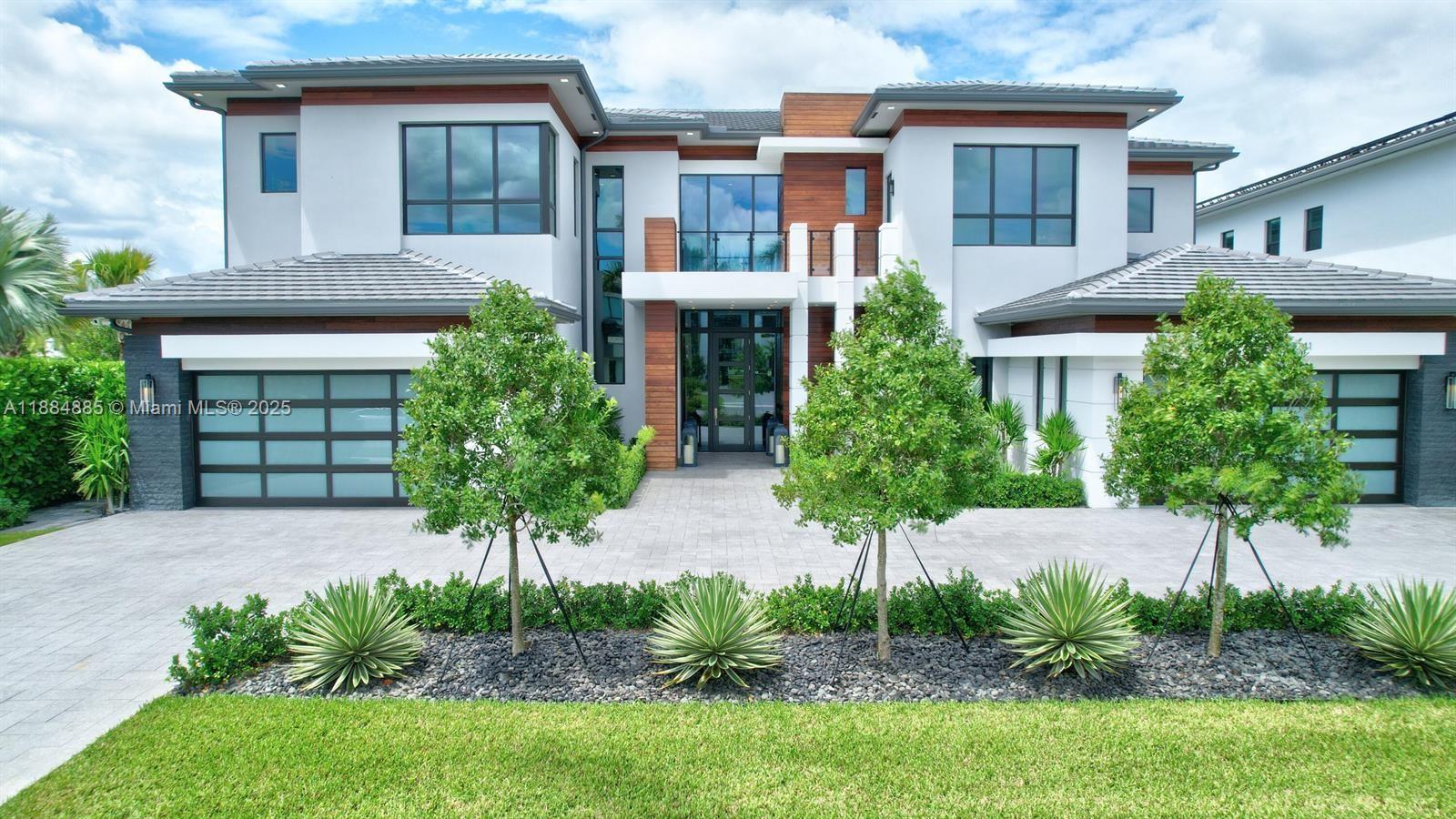 17241 Carretto Court Boca Raton, FL 33496 - Photo 4 of 35 a house view with a garden space