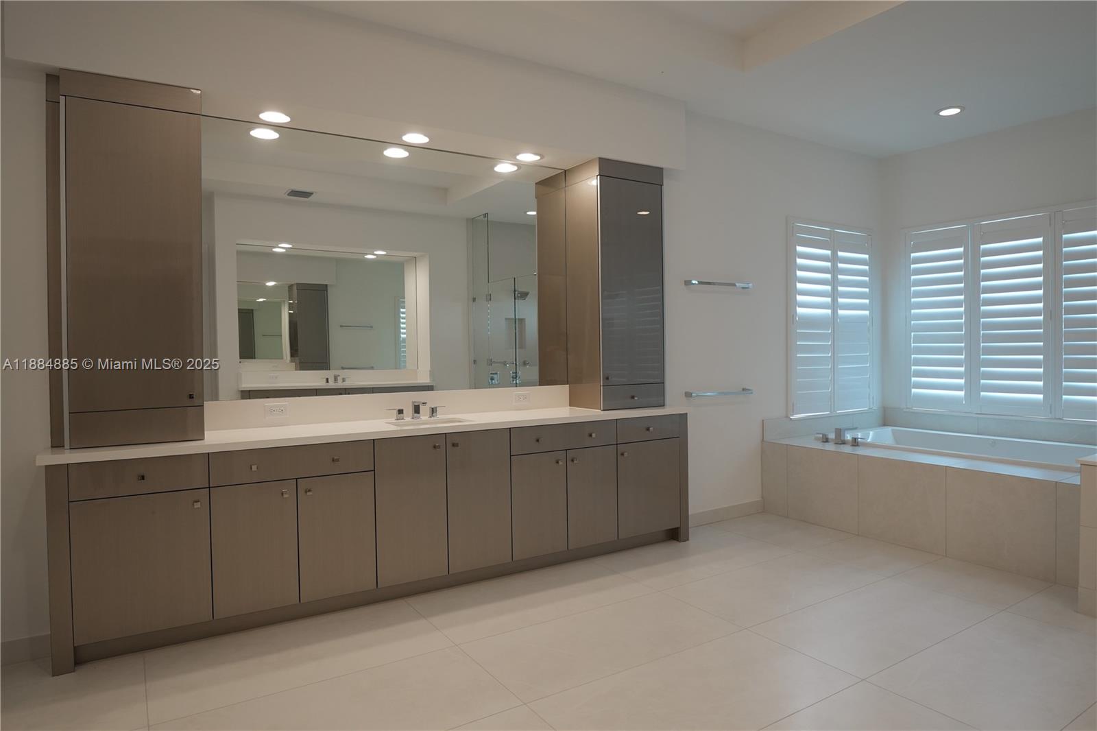 17241 Carretto Court Boca Raton, FL 33496 - Photo 8 of 35 a large bathroom with a large tub and sink