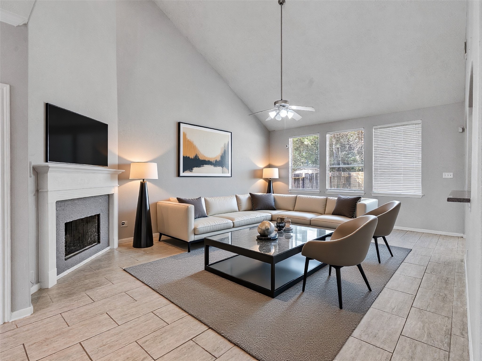 2615 Fern Lacy Drive Spring, TX 77388 - Photo 6 of 25 The living room is so huge that you can place all kinds of furniture and have the ability to arrange the furniture in various ways. Here's a virtually staged photo to help you visualize one of the many possibilities!