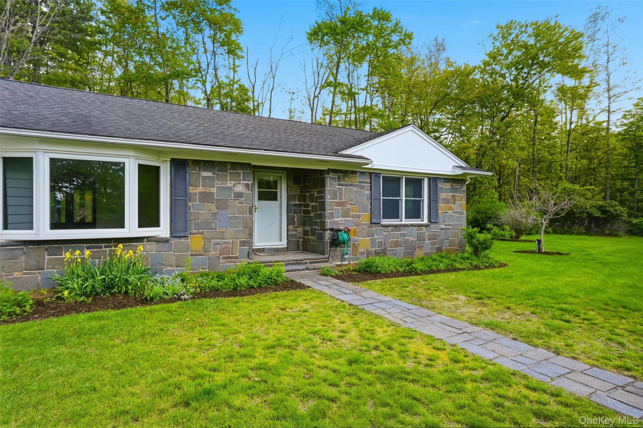 435 Samsonville Road Kerhonkson, NY 12446 - Photo 4 of 37 a front view of a house with a yard