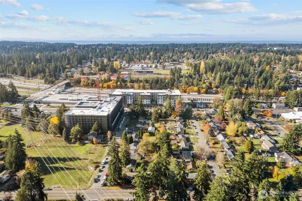 an aerial view of residential building with parking space