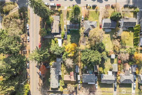 a aerial view of residential houses with outdoor space