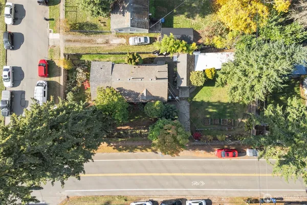 an aerial view of waterside residential houses with outdoor space