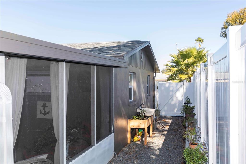 6324 Patella Avenue New Port Richey, FL 34653 - Photo 34 of 36 a backyard of a house with outdoor seating