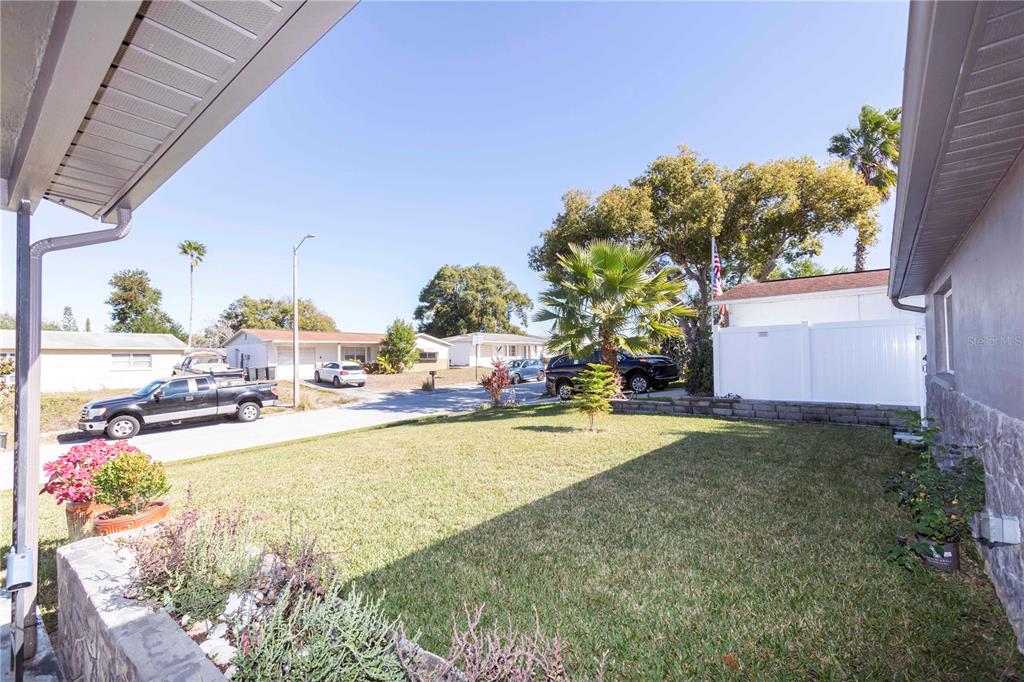 6324 Patella Avenue New Port Richey, FL 34653 - Photo 35 of 36 a view of a swimming pool with a patio