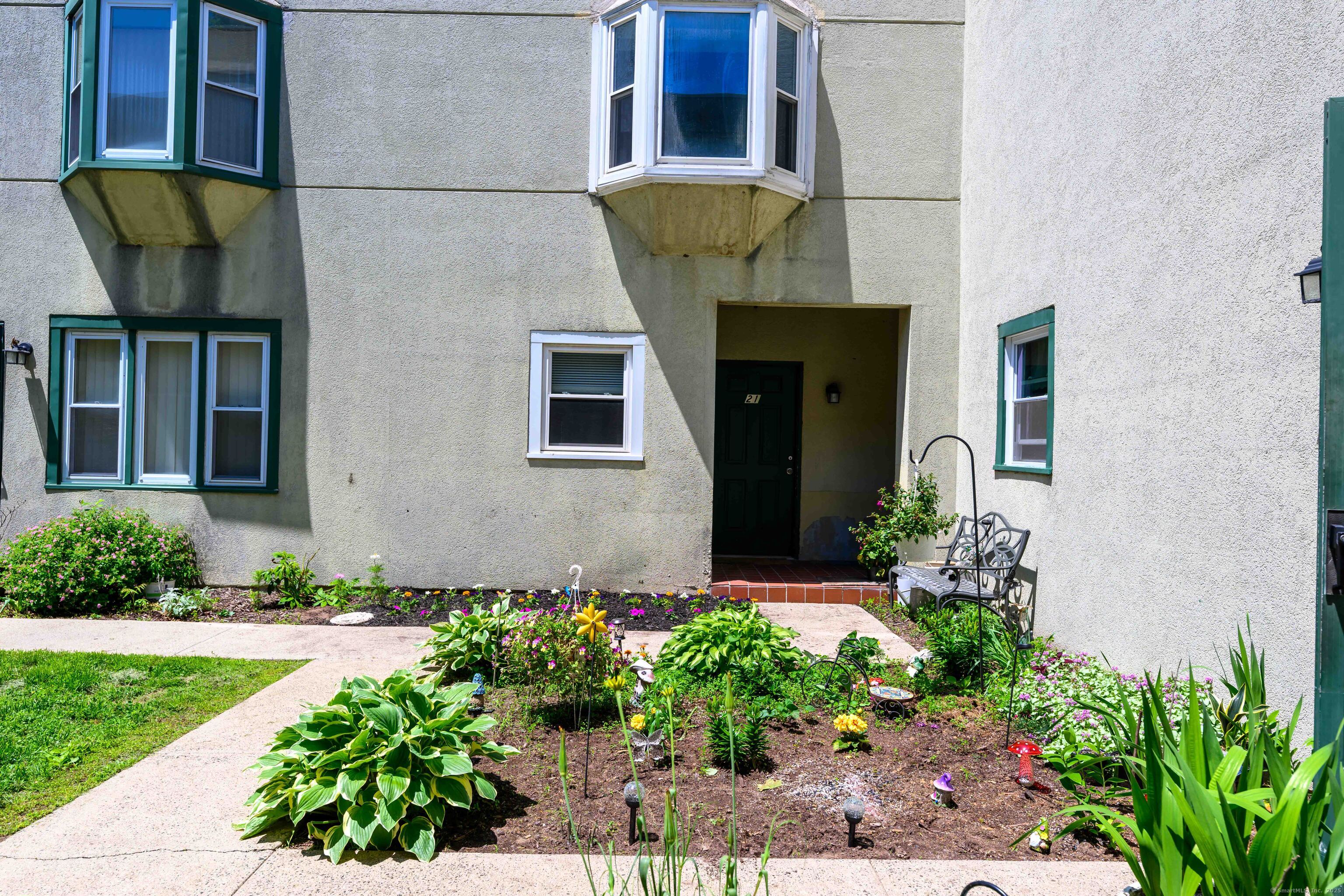 21 Judd Square, Unit 21 Wallingford, CT 06492 - Photo 1 of 1 Entrance through courtyard