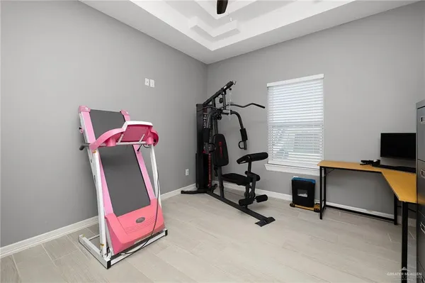 a view of a room with gym equipment