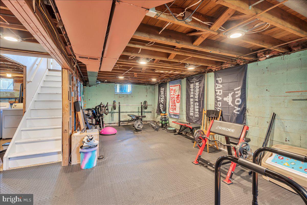 528 Rowand Avenue Glendora, NJ 08029 - Photo 17 of 24 a view of a room with gym equipment