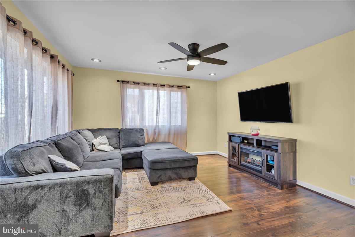 528 Rowand Avenue Glendora, NJ 08029 - Photo 5 of 24 a living room with furniture and a flat screen tv