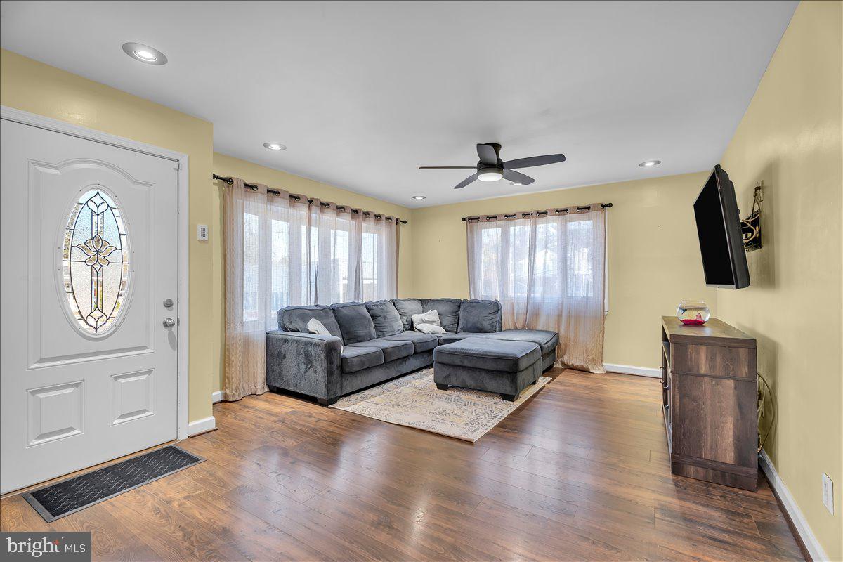 528 Rowand Avenue Glendora, NJ 08029 - Photo 6 of 24 a living room with furniture window and wooden floor