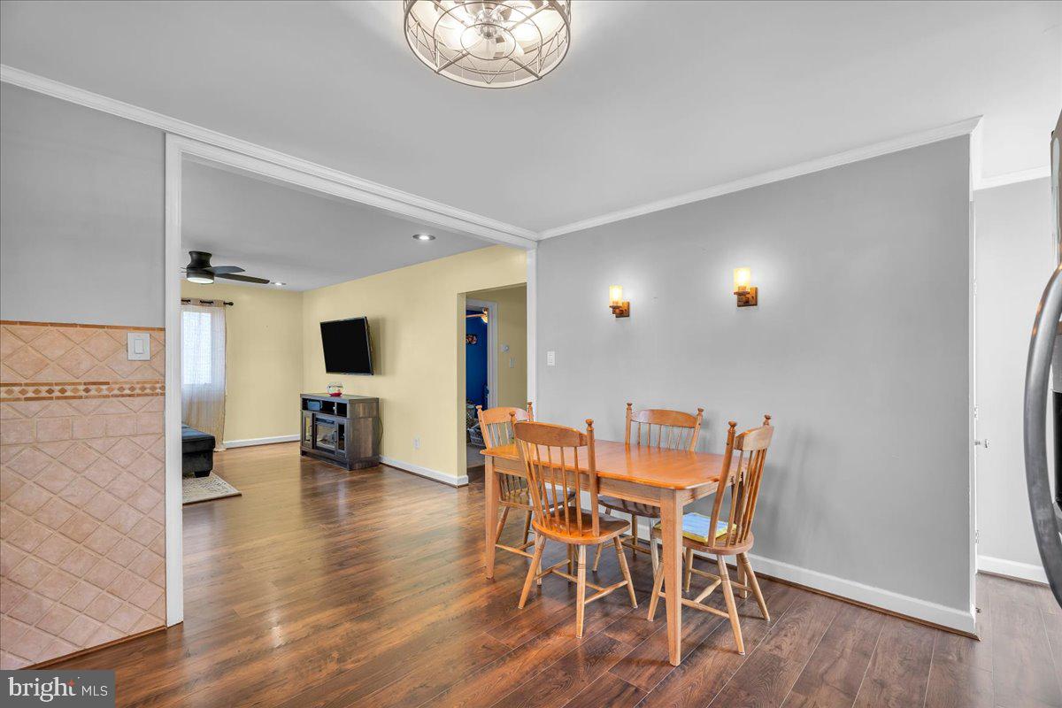 528 Rowand Avenue Glendora, NJ 08029 - Photo 8 of 24 a view of a dining room with furniture and wooden floor