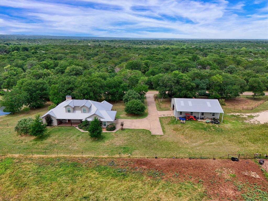613 Bone Road Valley Mills, TX 76689 - Photo 38 of 40 an aerial view of a house with a yard