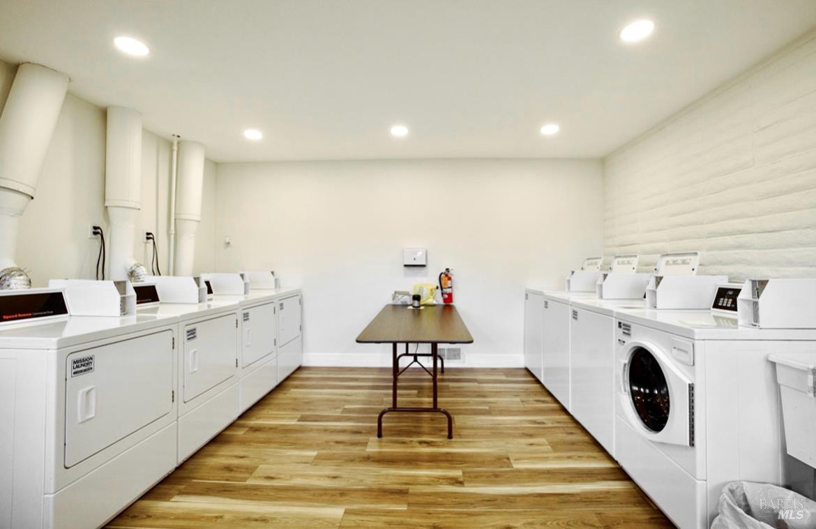 150 Silverado Trail, Unit 64 Napa, CA 94559 - Photo 19 of 21 a kitchen with cabinets a sink and white appliances