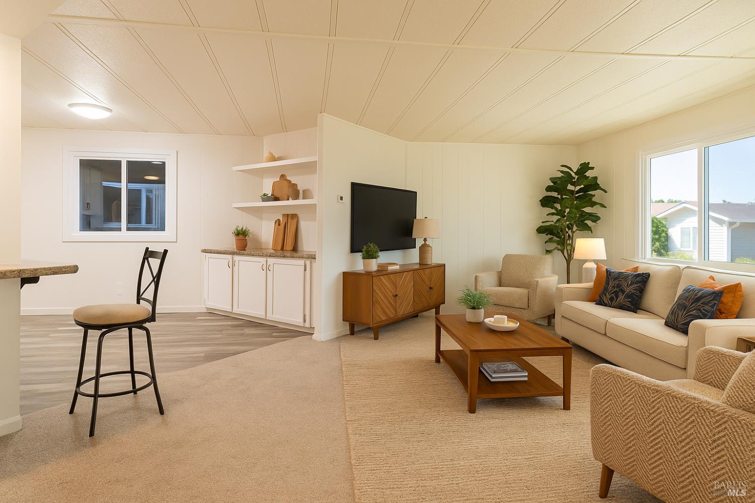 150 Silverado Trail, Unit 64 Napa, CA 94559 - Photo 5 of 21 a living room with furniture and a flat screen tv
