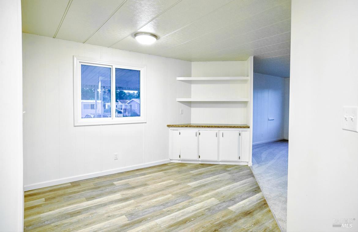 150 Silverado Trail, Unit 64 Napa, CA 94559 - Photo 6 of 21 a view of an empty room with a window