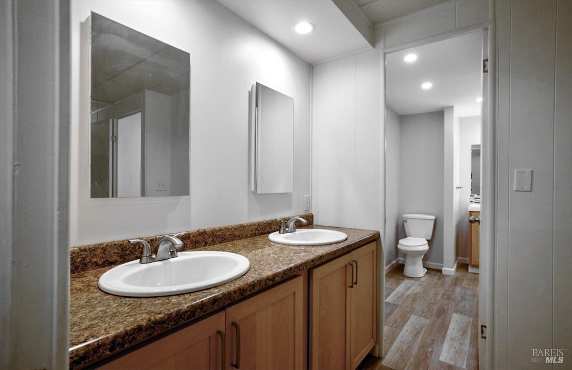 150 Silverado Trail, Unit 64 Napa, CA 94559 - Photo 9 of 21 a bathroom with a sink and a mirror