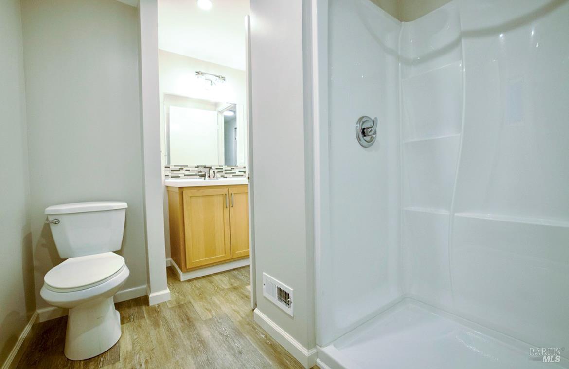 150 Silverado Trail, Unit 64 Napa, CA 94559 - Photo 10 of 21 a bathroom with a toilet and a shower