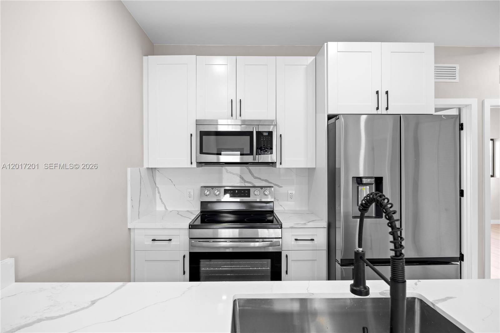630 Northeast 166th Street, Unit 3 Miami, FL 33162 - Photo 3 of 36