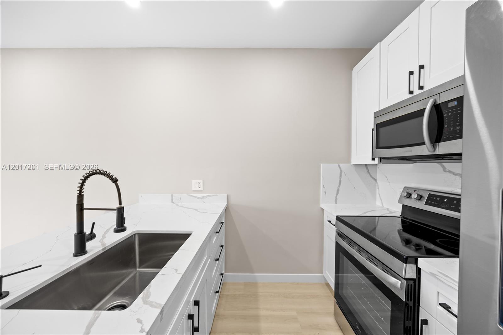 630 Northeast 166th Street, Unit 3 Miami, FL 33162 - Photo 4 of 36