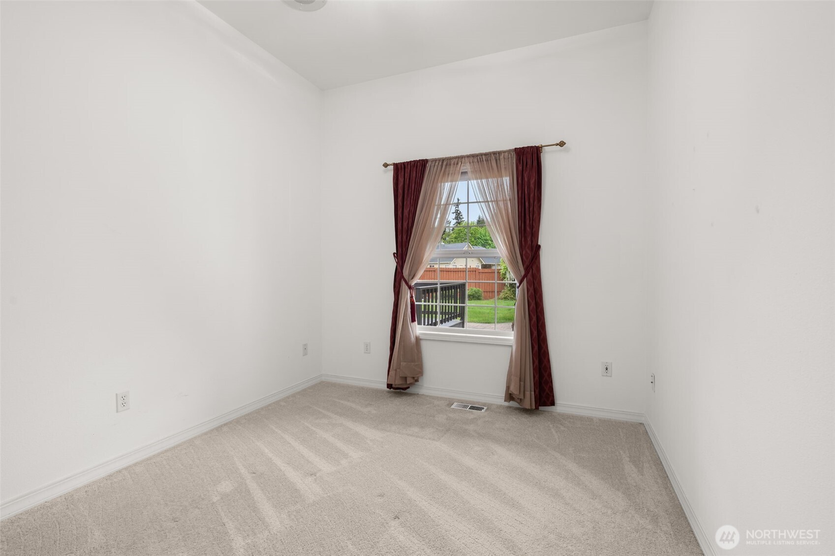 9609 346th Street South Roy, WA 98580 - Photo 21 of 37 a view of an empty room and a window