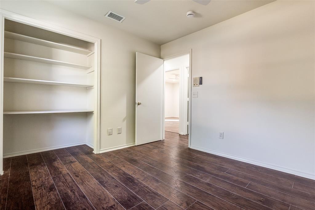 4728 Meadow Ridge Drive Dallas, TX 75236 - Photo 20 of 25 a view of an empty room with wooden floor