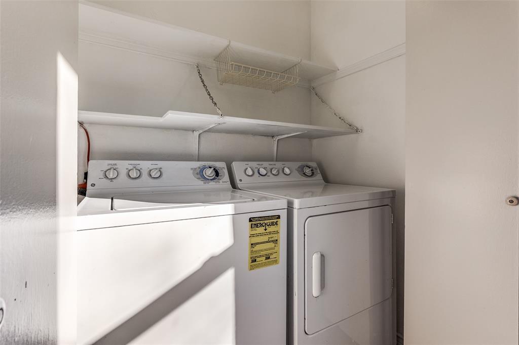 4728 Meadow Ridge Drive Dallas, TX 75236 - Photo 22 of 25 a utility room with dryer and washer