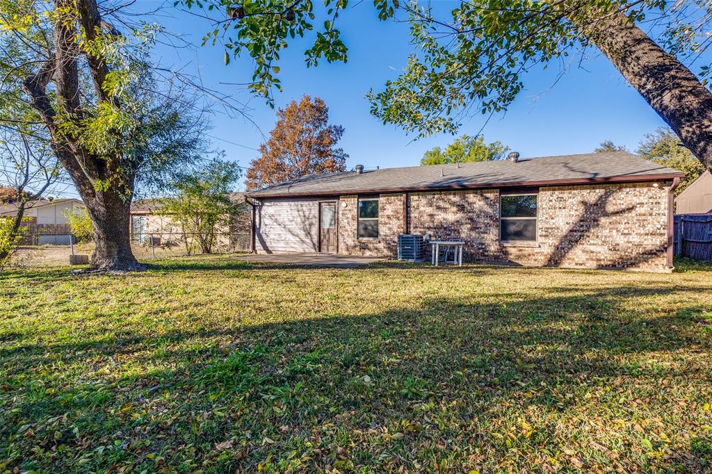 4728 Meadow Ridge Drive Dallas, TX 75236 - Photo 23 of 25 a front view of a house with garden