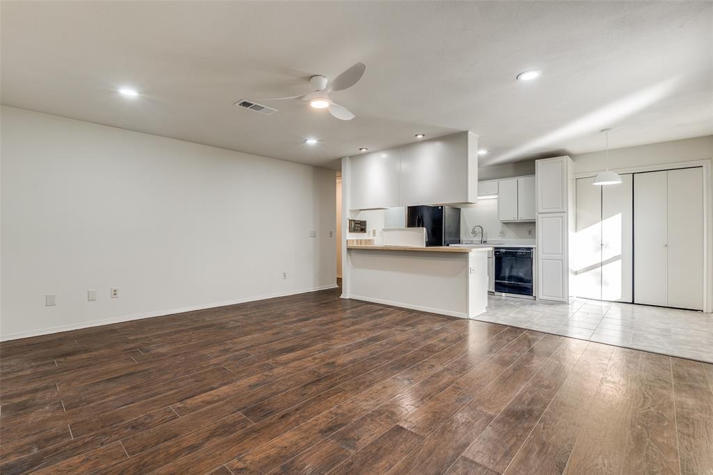 4728 Meadow Ridge Drive Dallas, TX 75236 - Photo 5 of 25 a view of kitchen with cabinets and wooden floor
