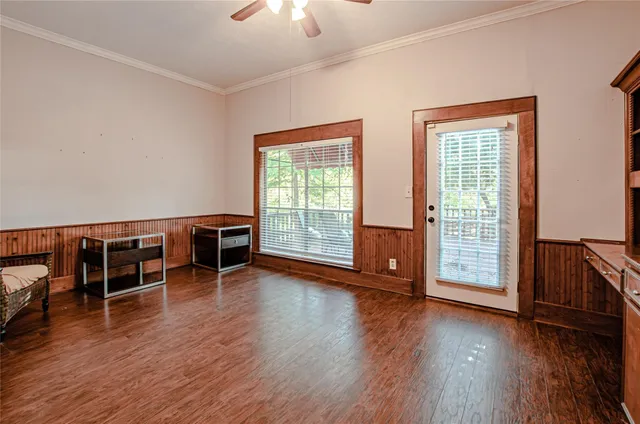 a view of a livingroom with furniture and wooden floor