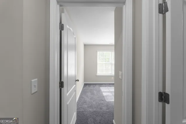 a view of a room that has a window in it