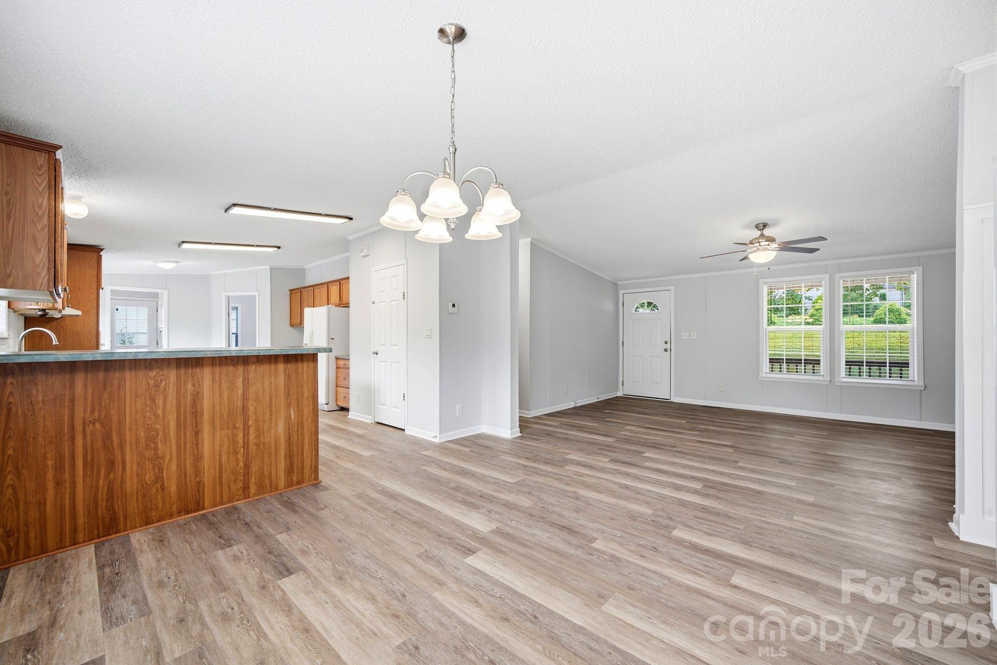 2368 Beth Haven Church Road Denver, NC 28037 - Photo 34 of 42 a view of a kitchen with wooden floor and a sink