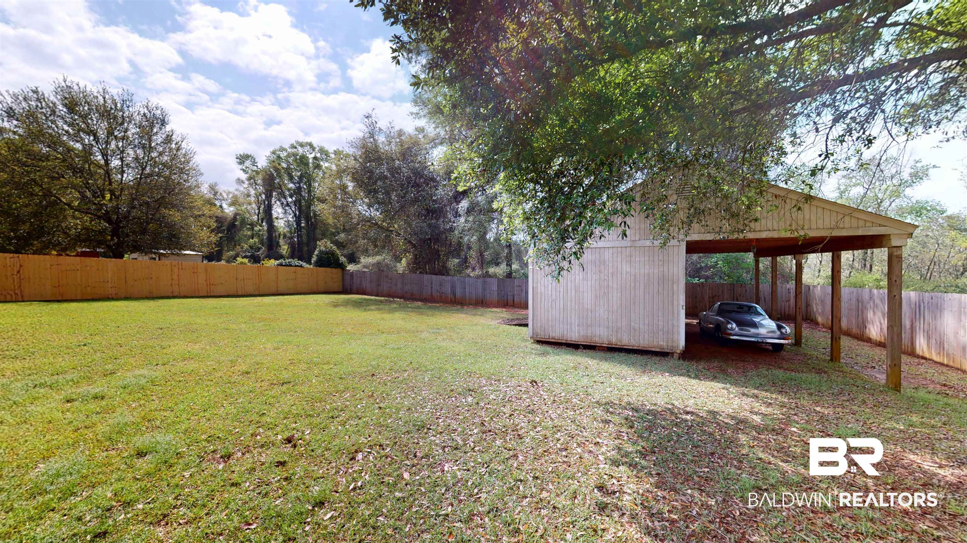 10753 Rigby Drive Mobile, AL 36695 - Photo 28 of 33 Extra Bonus - property includes an approx 12 ft. x 32 ft. outdoor storage room with attached 12 ft. x 32 ft. carport!
