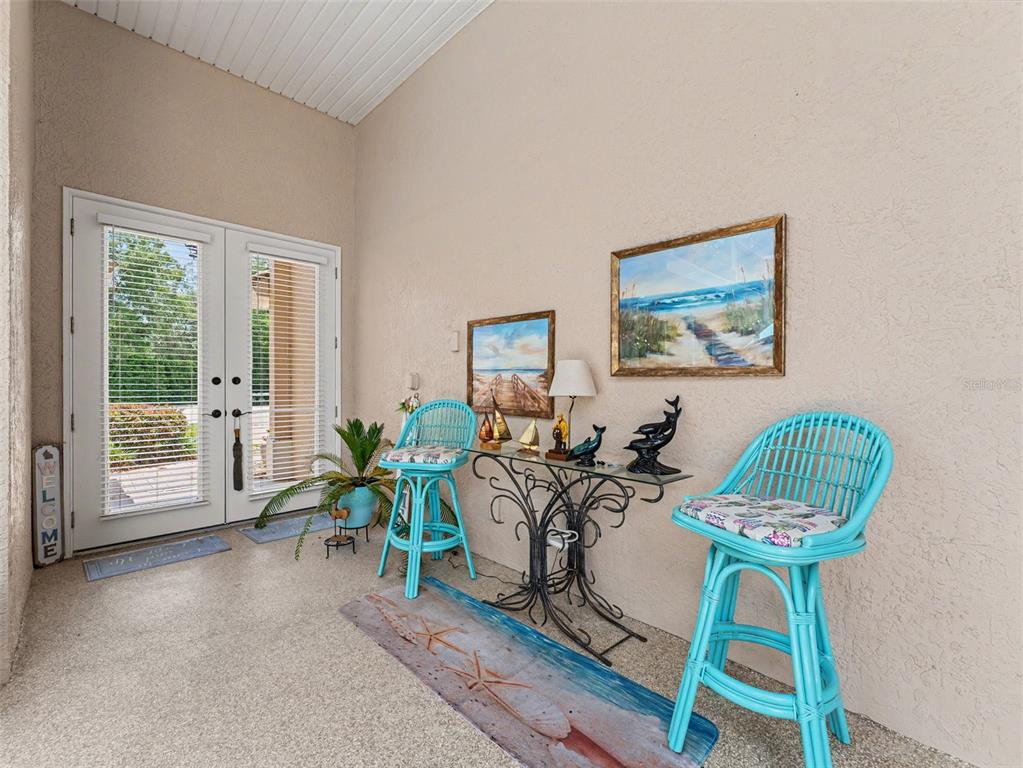 8910 Jericho Road Weeki Wachee, FL 34613 - Photo 6 of 52 a living room with furniture a window and a potted plant