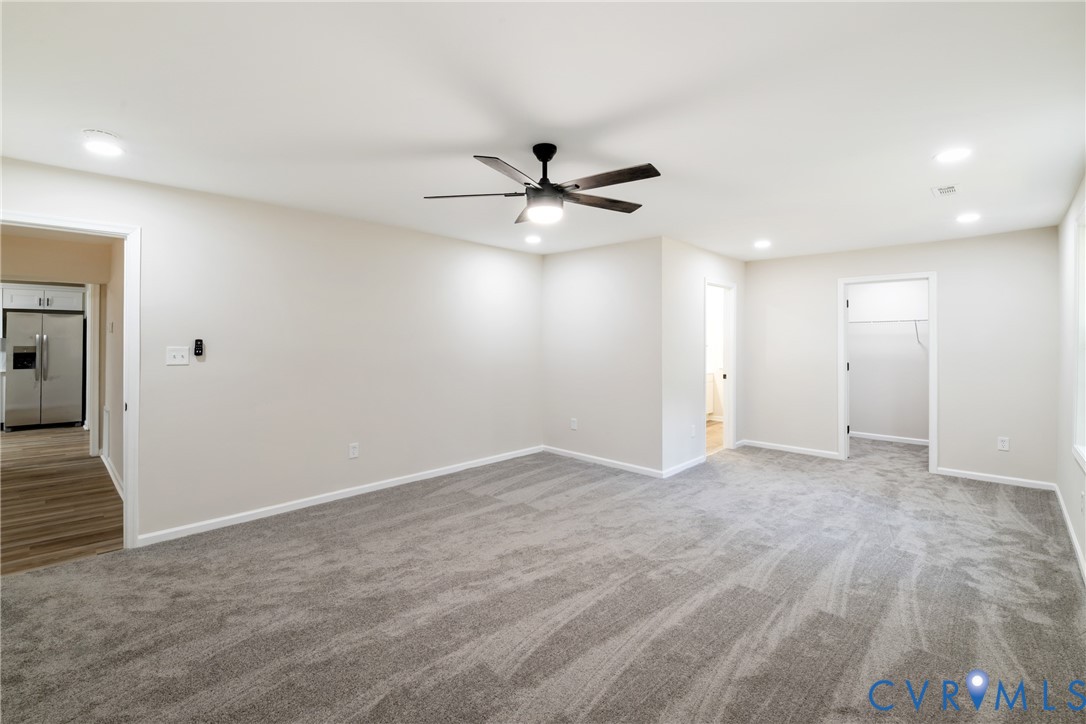 1531 Pughs Store Road Afton, VA 22920 - Photo 16 of 40 an empty room with fan and ceiling fan