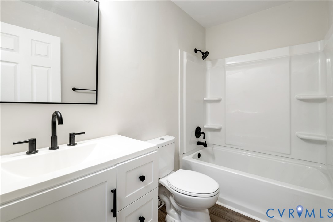 1531 Pughs Store Road Afton, VA 22920 - Photo 23 of 40 a bathroom with a sink a toilet and a bathtub