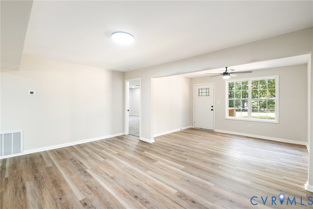 1531 Pughs Store Road Afton, VA 22920 - Photo 5 of 40 an empty room with wooden floor and windows