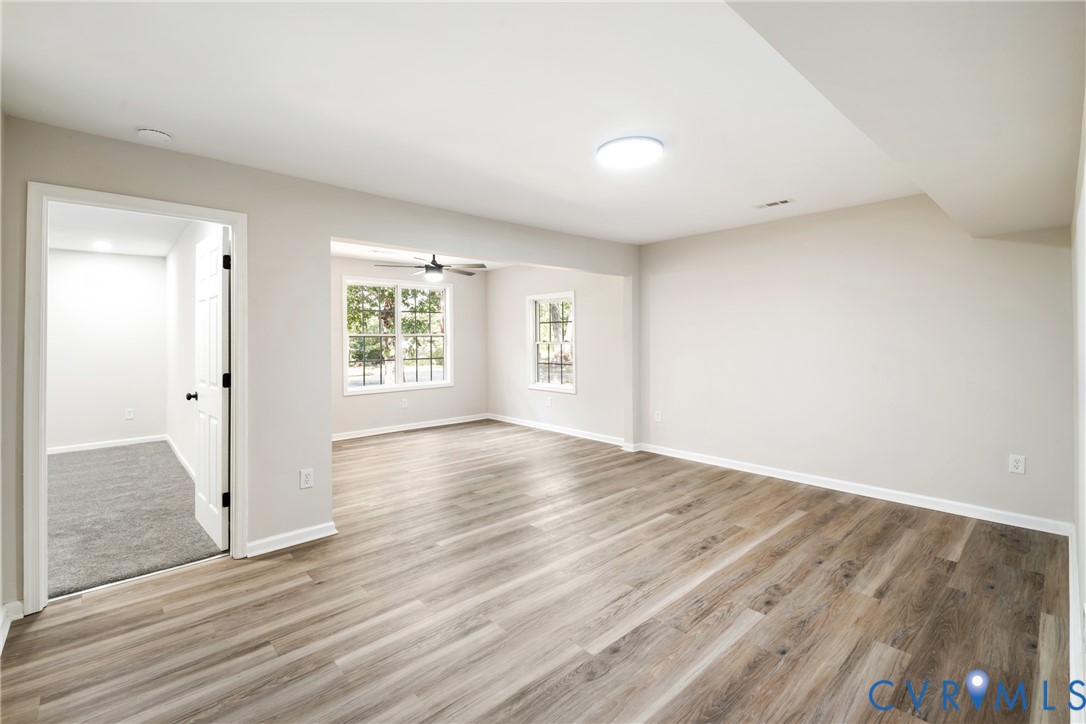1531 Pughs Store Road Afton, VA 22920 - Photo 6 of 40 an empty room with wooden floor and windows