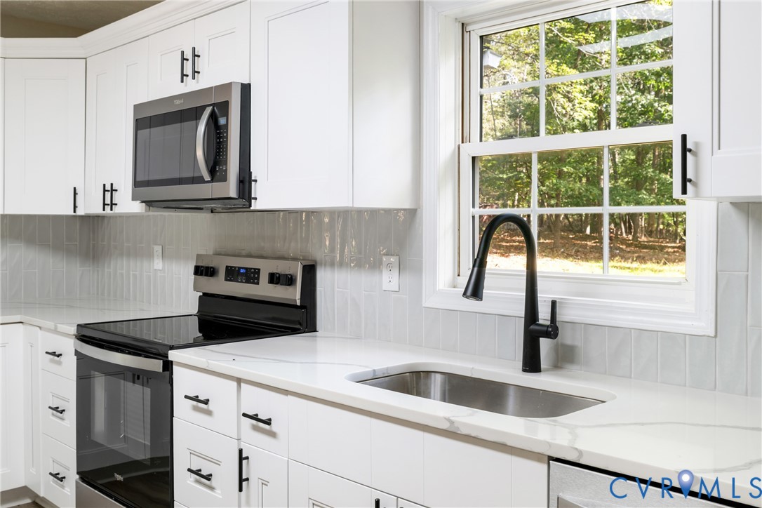 1531 Pughs Store Road Afton, VA 22920 - Photo 10 of 40 a kitchen with a sink and a microwave