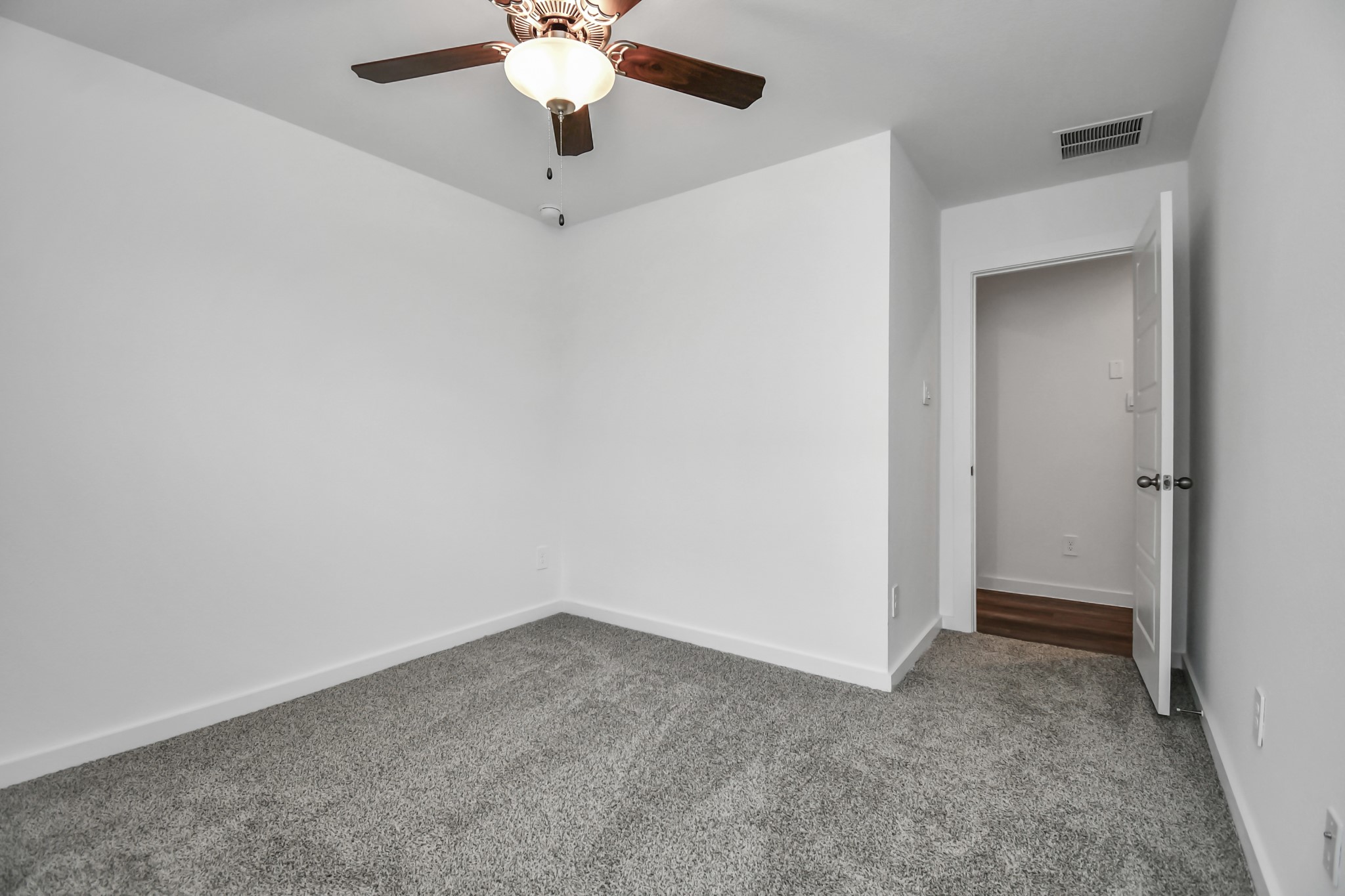 1110 Fringed Bluestar Drive Rosharon, TX 77583 - Photo 19 of 41 an empty room with a chandelier fan