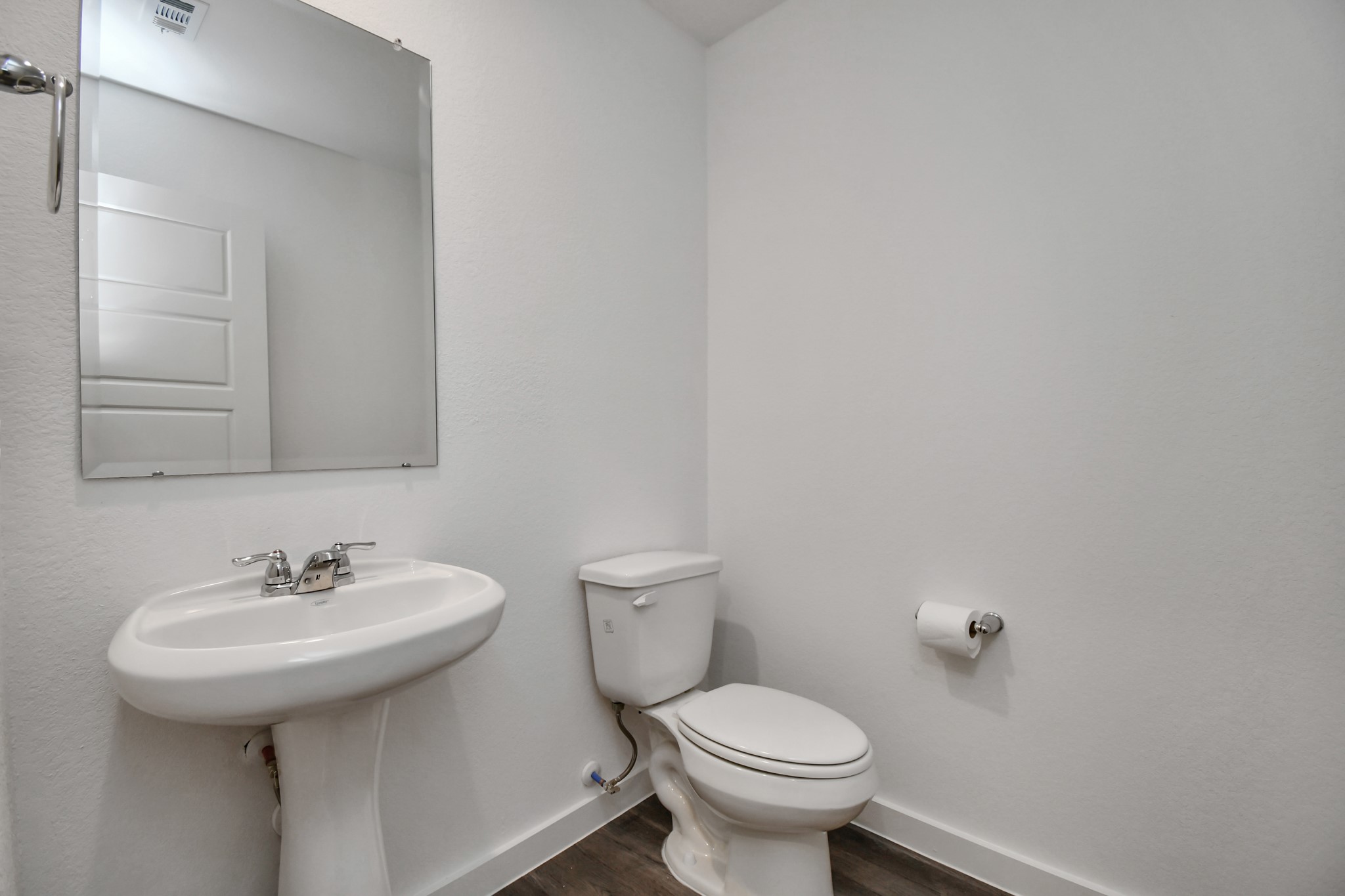 1110 Fringed Bluestar Drive Rosharon, TX 77583 - Photo 20 of 41 a bathroom with a sink a toilet and mirror