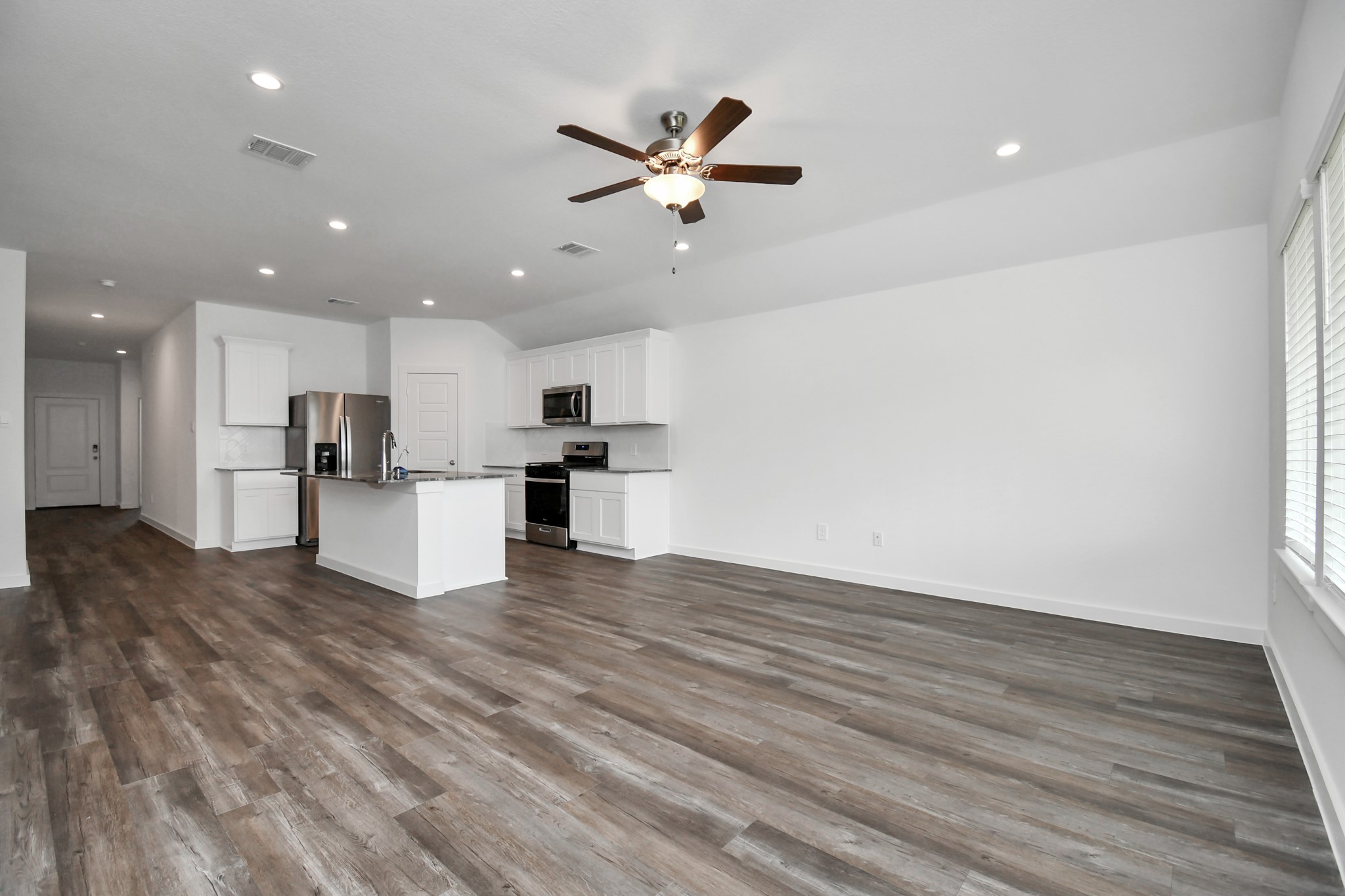 1110 Fringed Bluestar Drive Rosharon, TX 77583 - Photo 33 of 41 a view of kitchen with cabinets appliances and wooden floor