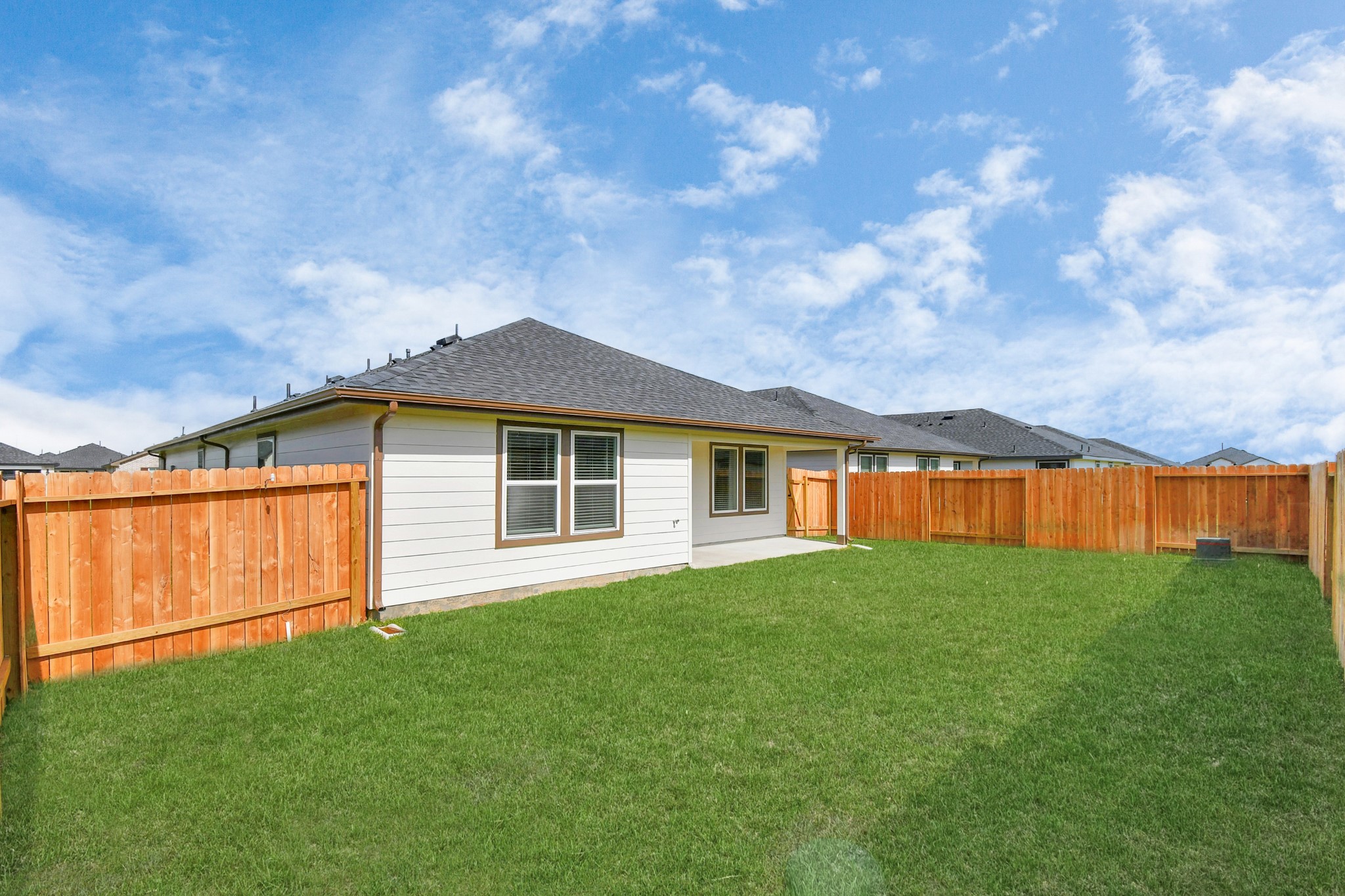 1110 Fringed Bluestar Drive Rosharon, TX 77583 - Photo 10 of 41 a front view of a house with a garden