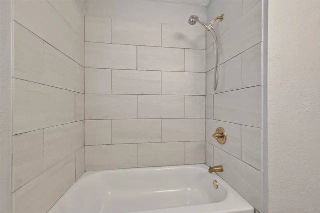 a bathroom with a bathtub